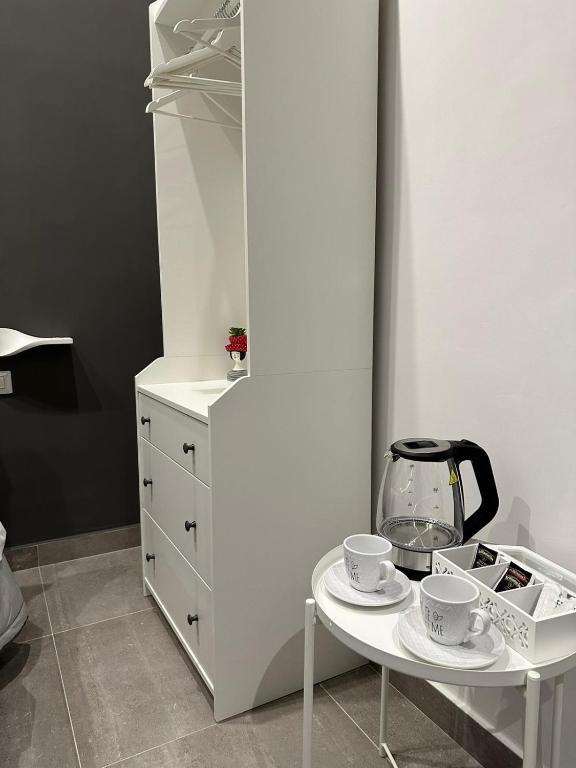 Príslušenstvo na prípravu kávy alebo čaju v ubytovaní B&B Carme