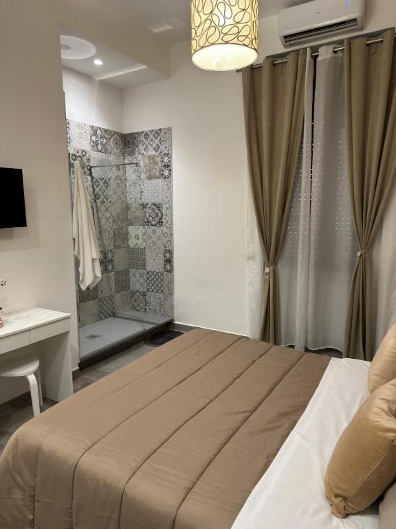 Posteľ alebo postele v izbe v ubytovaní B&B Carme