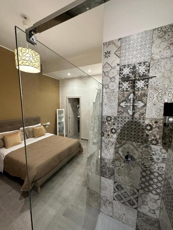 Posteľ alebo postele v izbe v ubytovaní B&B Carme