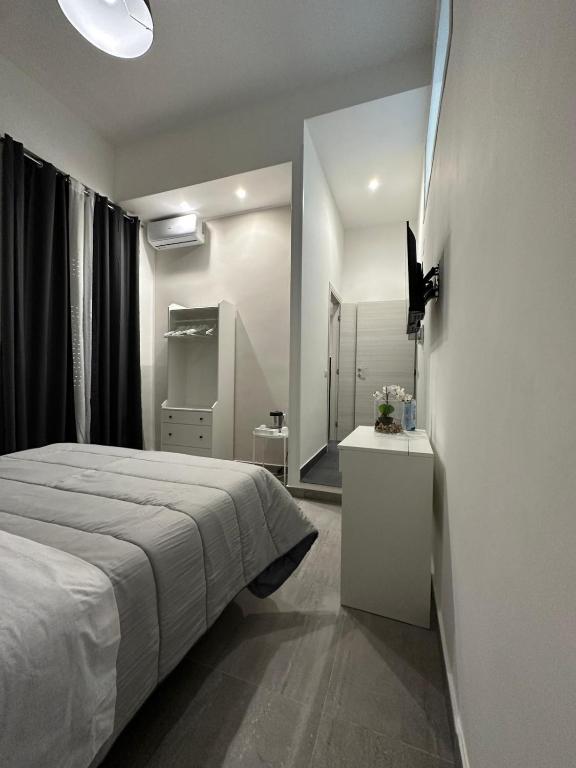 Posteľ alebo postele v izbe v ubytovaní B&B Carme