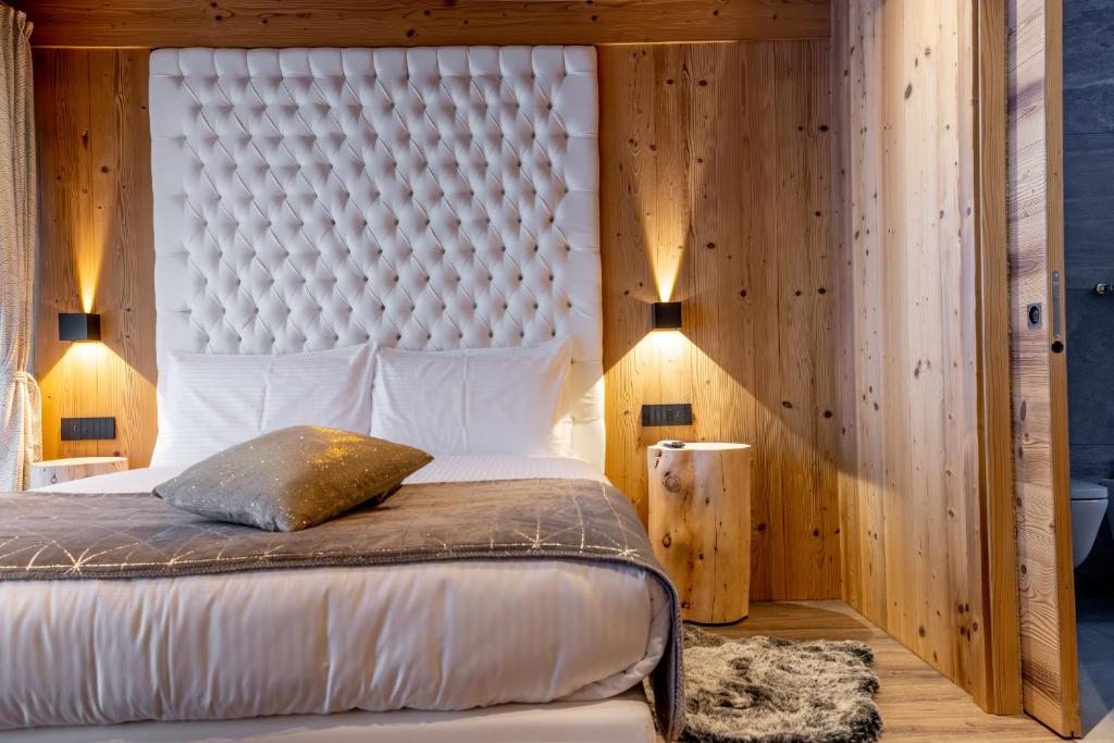 Ένα ή περισσότερα κρεβάτια σε δωμάτιο στο Chalet Imbosc'chè