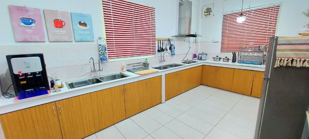 Kuchyň nebo kuchyňský kout v ubytování Kota Kinabalu Sabah City Homestay