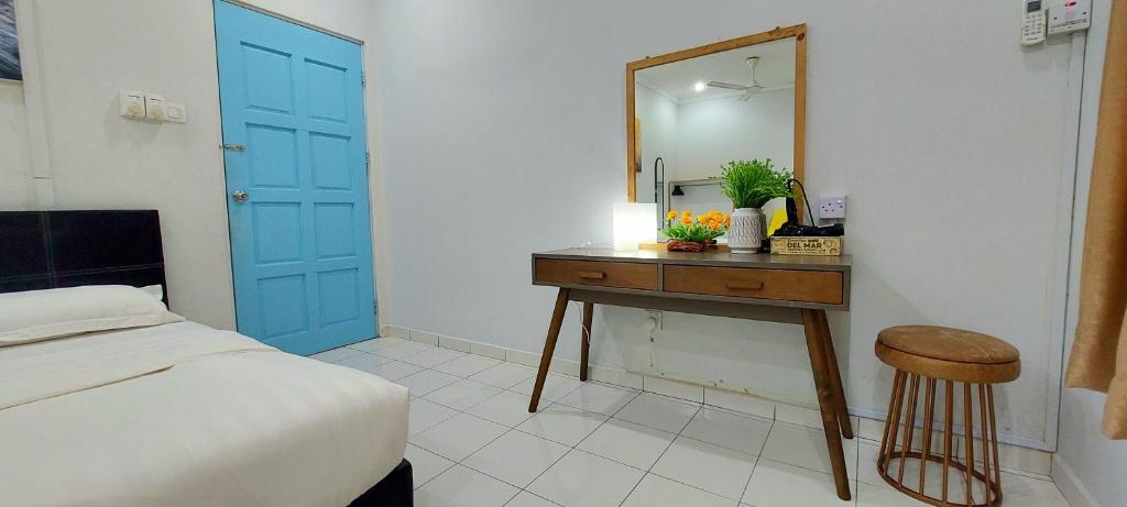 Postel nebo postele na pokoji v ubytování Kota Kinabalu Sabah City Homestay