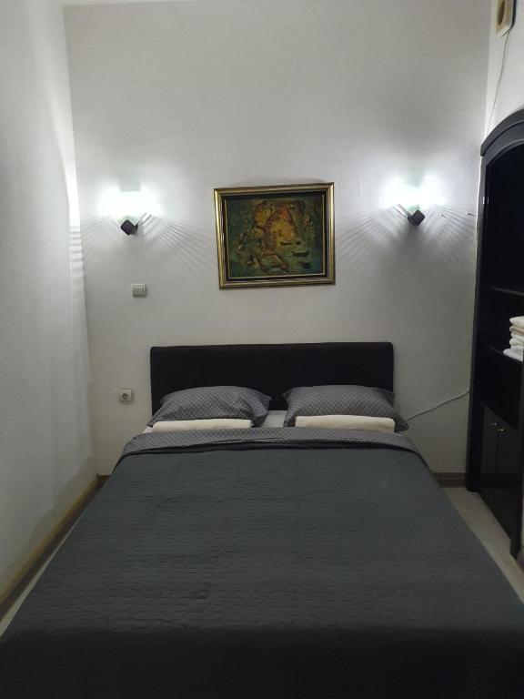 Postel nebo postele na pokoji v ubytování SB Apartman