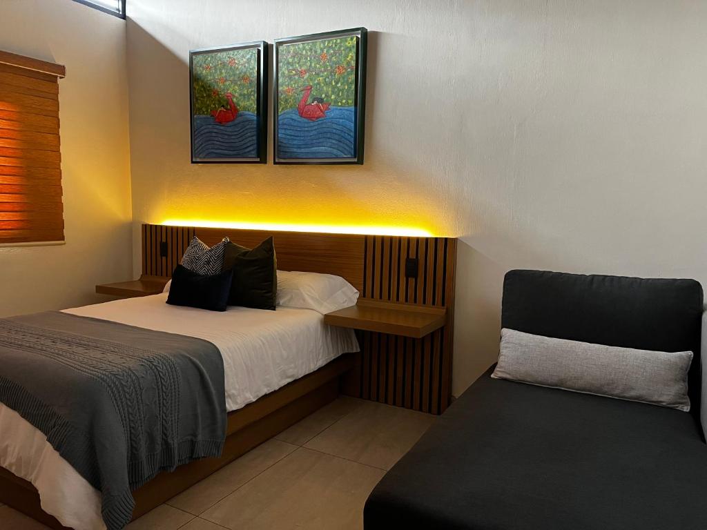 Postel nebo postele na pokoji v ubytování Cabaña Quinta Gaes Spa