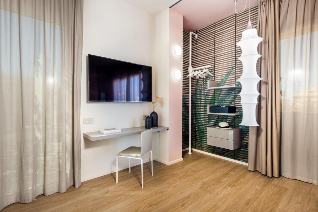 TV a/nebo společenská místnost v ubytování Open Hotel