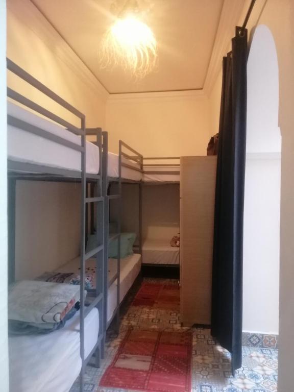 Postel nebo postele na pokoji v ubytování Hostel Laksour