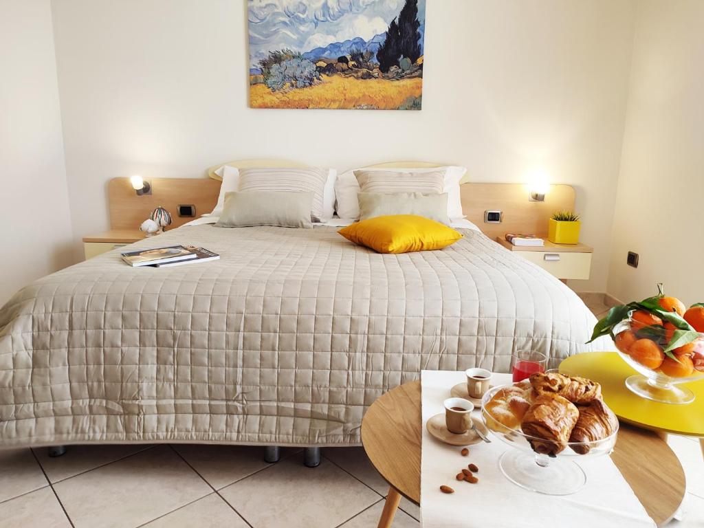 Postel nebo postele na pokoji v ubytování Avantgarde Hotel