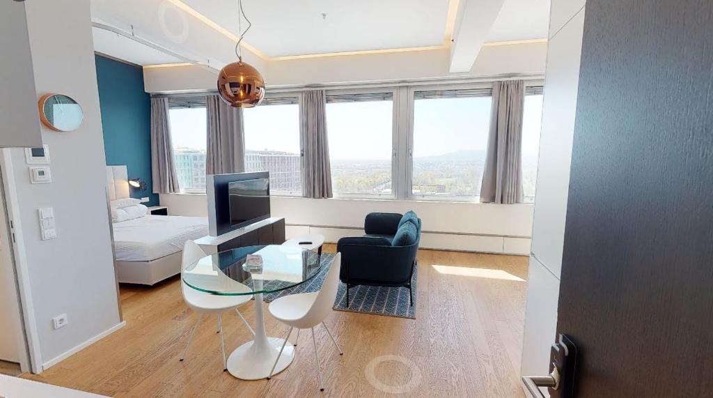 Łóżko lub łóżka w pokoju w obiekcie Key Residences Vienna