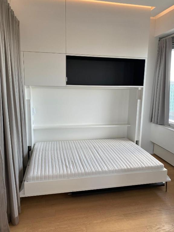 Łóżko lub łóżka w pokoju w obiekcie Key Residences Vienna