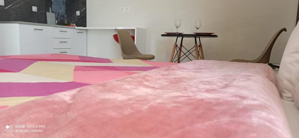 Postel nebo postele na pokoji v ubytování Spiros Rooms