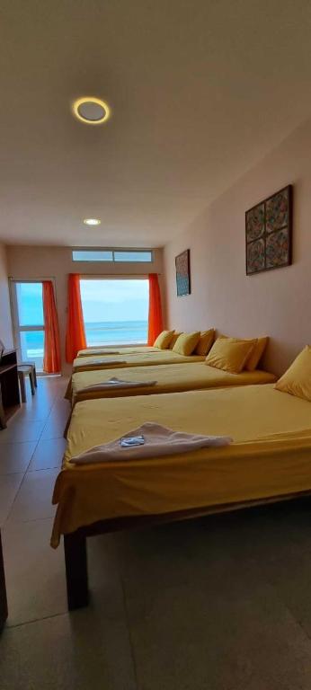 Postel nebo postele na pokoji v ubytování Hotel Ola Bella