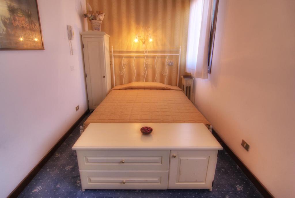 Postel nebo postele na pokoji v ubytování Al Soffiador