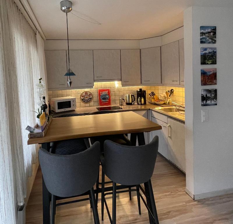 Kuchyň nebo kuchyňský kout v ubytování Ferienwohnung Gemmiblick