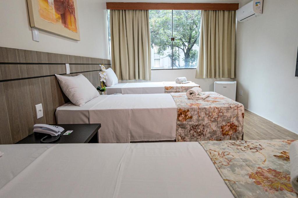 Ένα ή περισσότερα κρεβάτια σε δωμάτιο στο Hotel Nacional Inn São Paulo- Próximo ao SAMPA SKY