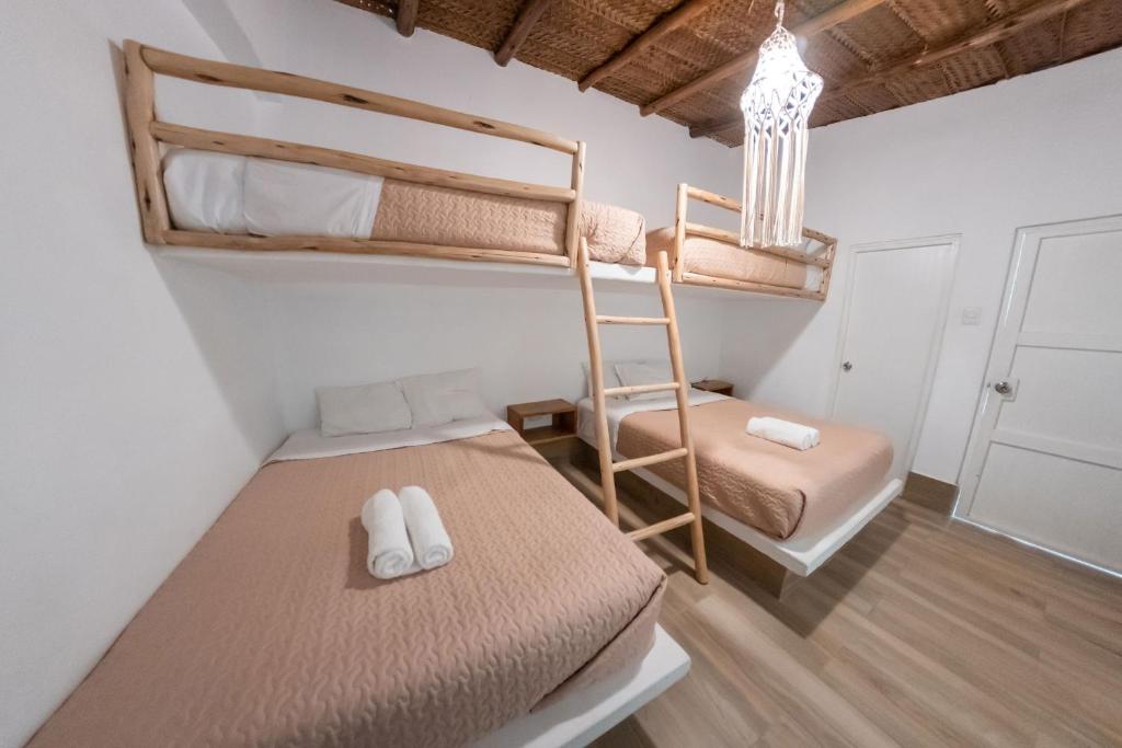 Postel nebo postele na pokoji v ubytování Hotel Boutique Beso de Sal