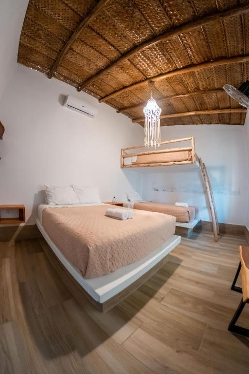 Postel nebo postele na pokoji v ubytování Hotel Boutique Beso de Sal