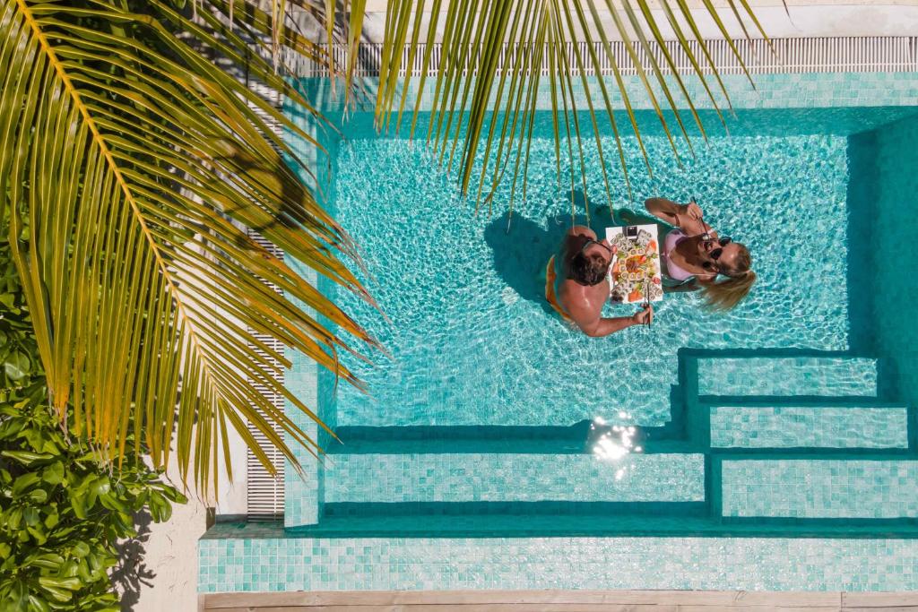 Bazén v ubytování Sun Siyam Iru Veli - 24 Hours Premium All-Inclusive with Free Transfers nebo v jeho okolí
