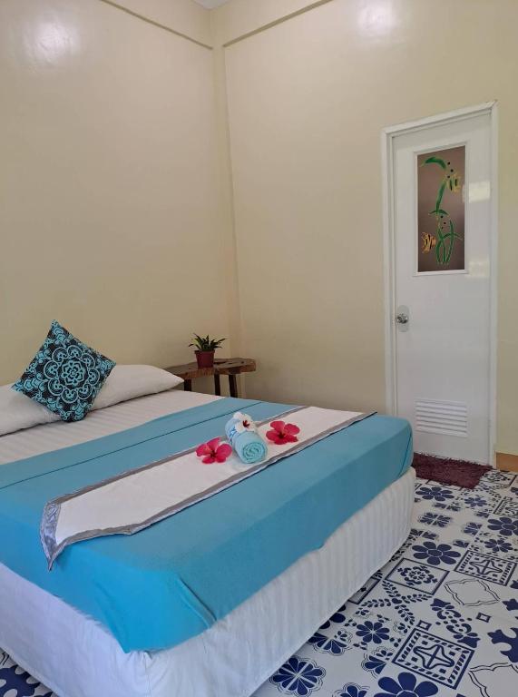 Postel nebo postele na pokoji v ubytování Happy's Homestay