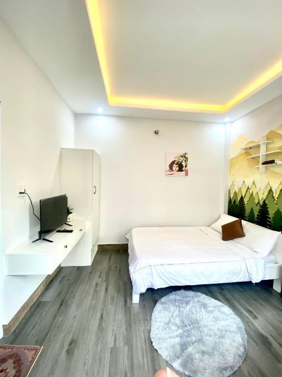 Giường trong phòng chung tại Tùng Homestay