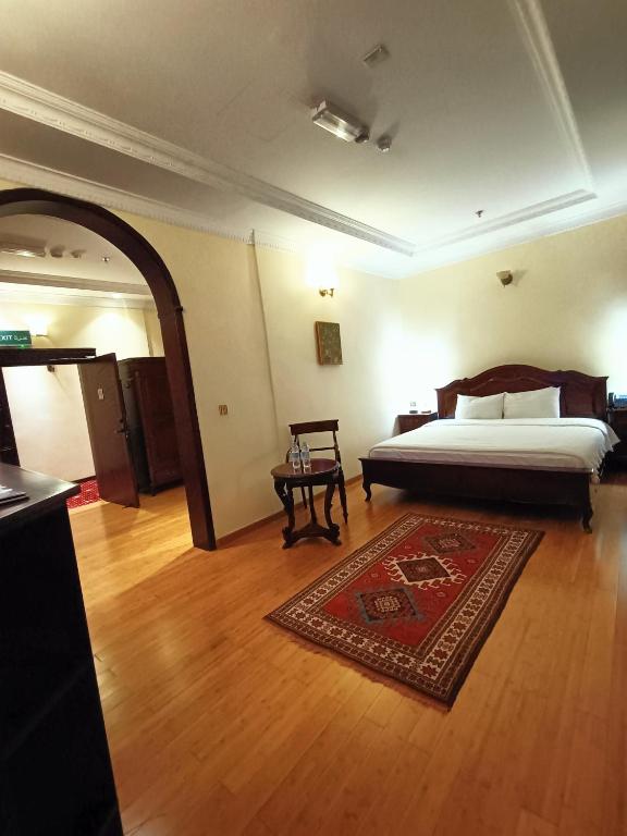 Katil atau katil-katil dalam bilik di Al Khariss Hotel