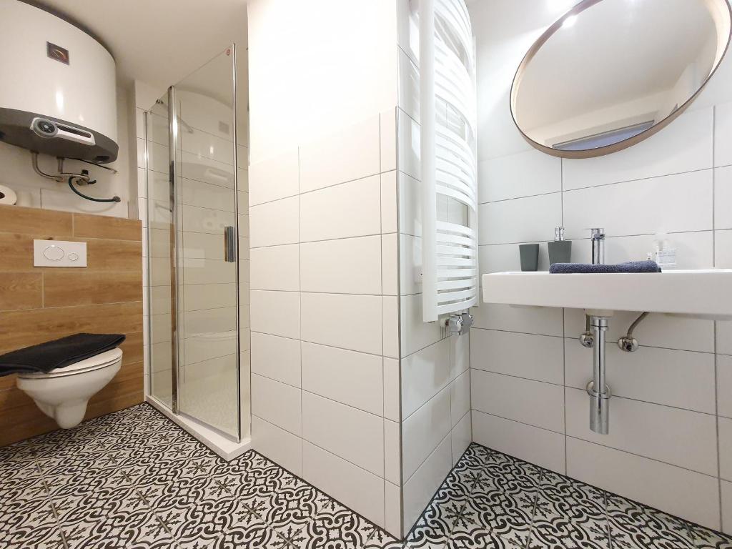 Koupelna v ubytování Apartmány U Muzea