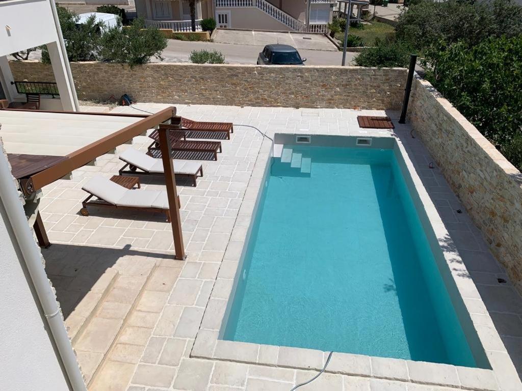 Bazén v ubytovaní Apartment in Vodice with terrace, air conditioning, WiFi, dishwasher, Pool 4932-4 alebo v jeho blízkosti