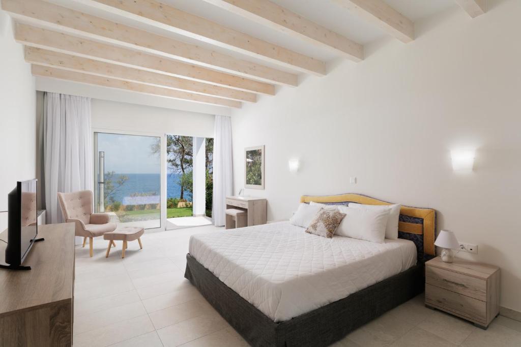 Postel nebo postele na pokoji v ubytování Nisos Villas Corfu