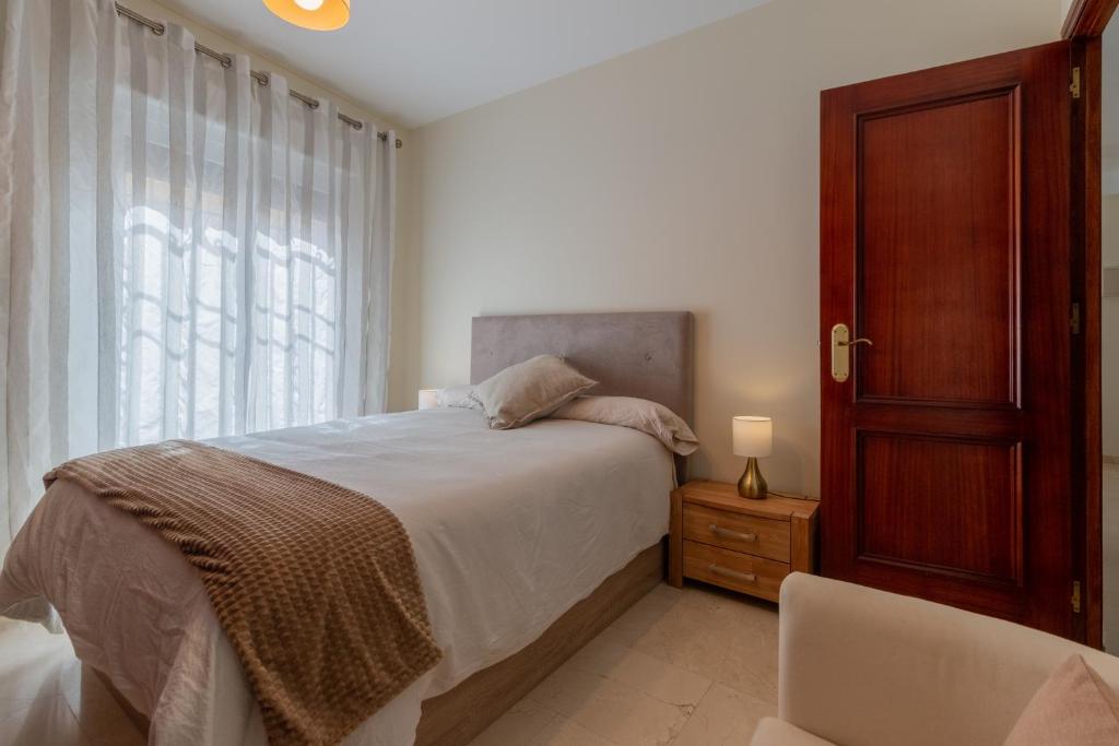 Posteľ alebo postele v izbe v ubytovaní Apartamento céntrico Cárdenas