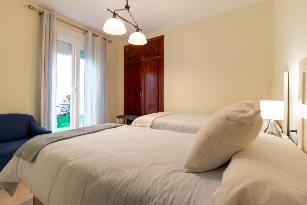 Posteľ alebo postele v izbe v ubytovaní Apartamento céntrico Cárdenas