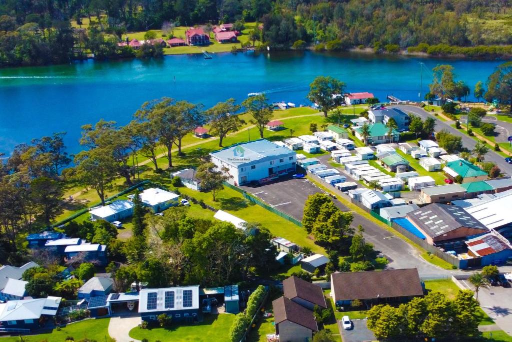 an aerial view of a campgrounds next to a lake at The Coastal Nest in Sussex Inlet