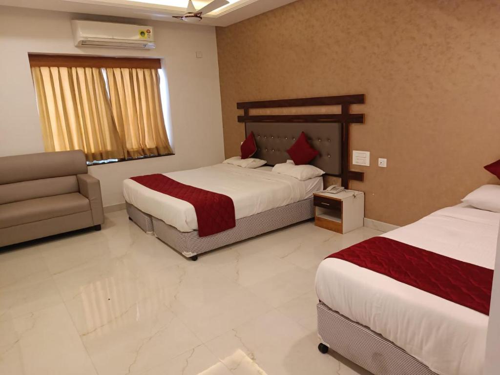 Postel nebo postele na pokoji v ubytování Hotel Woodside Prestige