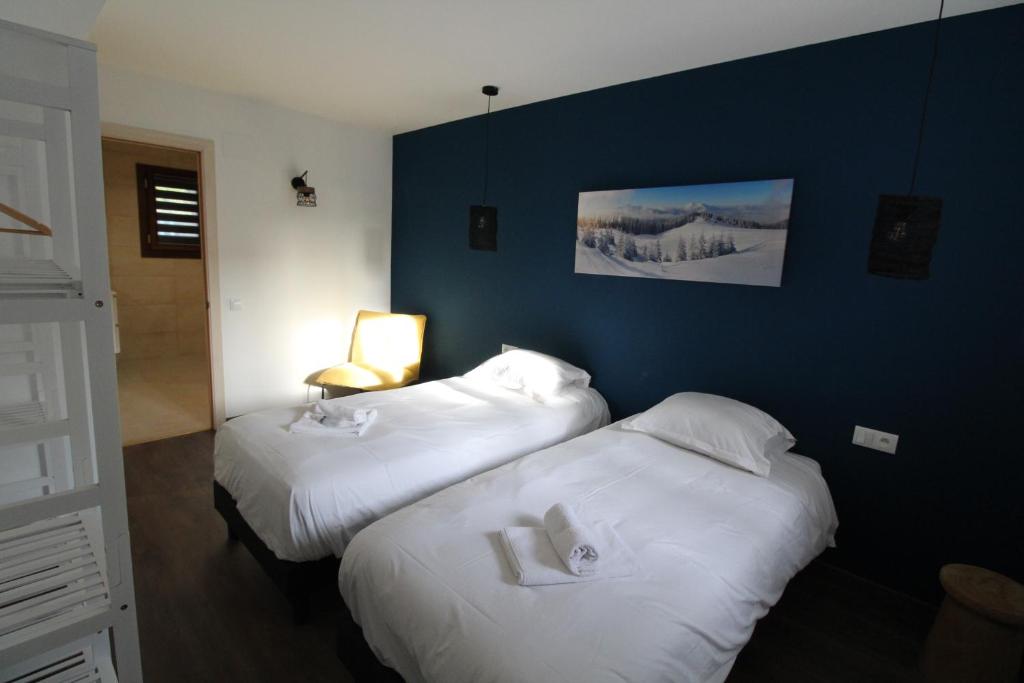 Postel nebo postele na pokoji v ubytování Les lofts M