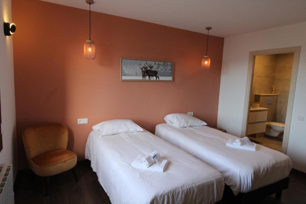 Postel nebo postele na pokoji v ubytování Les lofts M