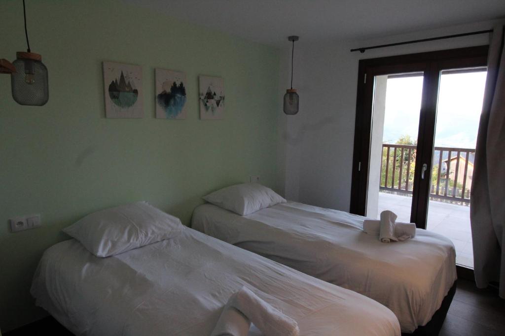 Postel nebo postele na pokoji v ubytování Les lofts M
