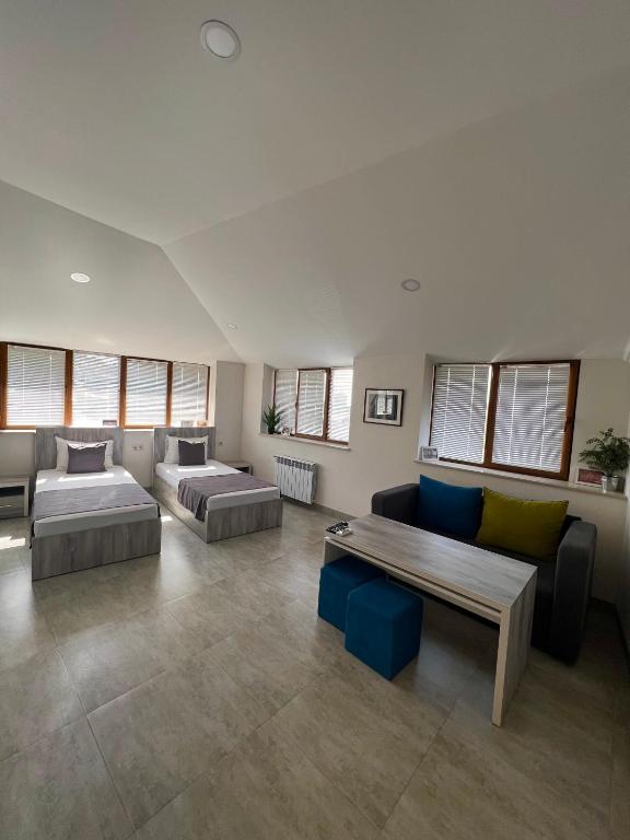 Postel nebo postele na pokoji v ubytování Hotel Menua