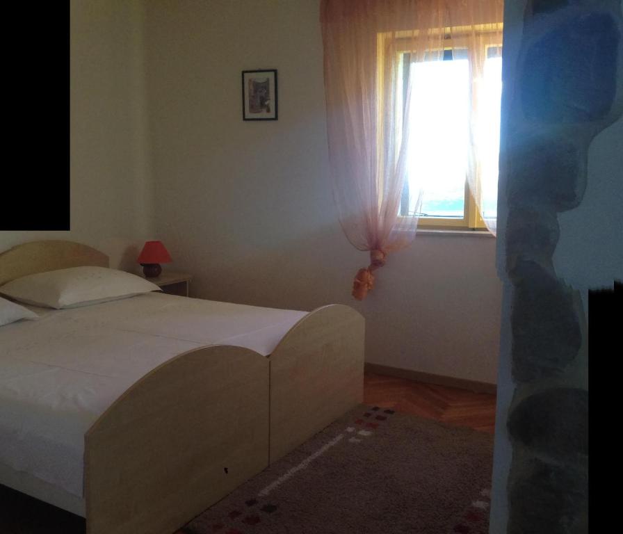 Posteľ alebo postele v izbe v ubytovaní Apartments Ana+3