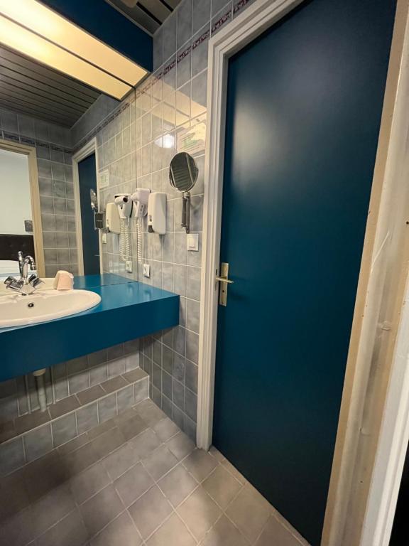 Koupelna v ubytování Hôtel Agena