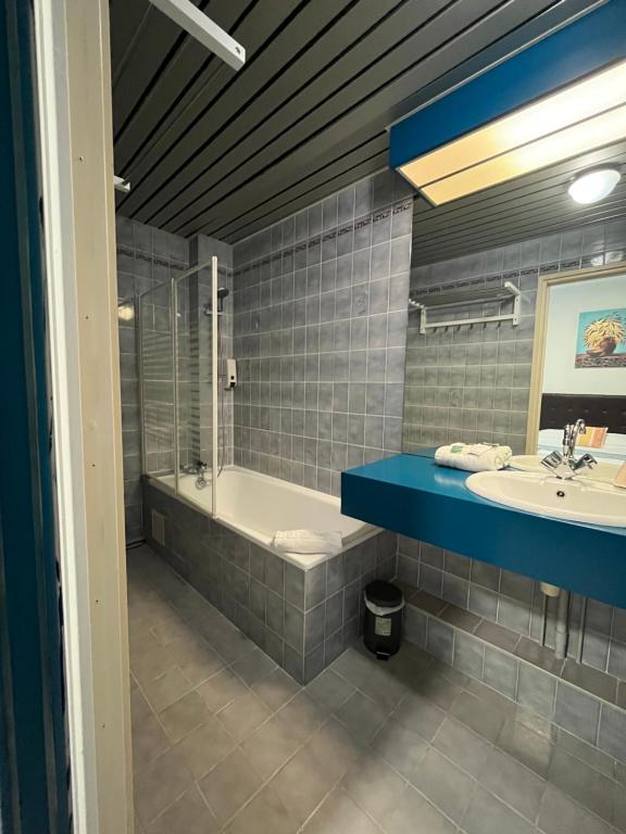 Koupelna v ubytování Hôtel Agena