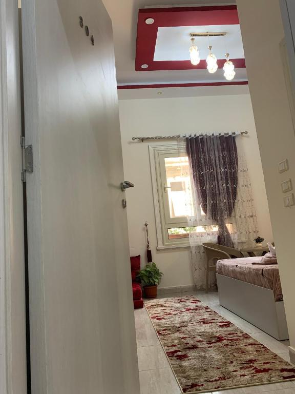 Postel nebo postele na pokoji v ubytování Crown Hotel