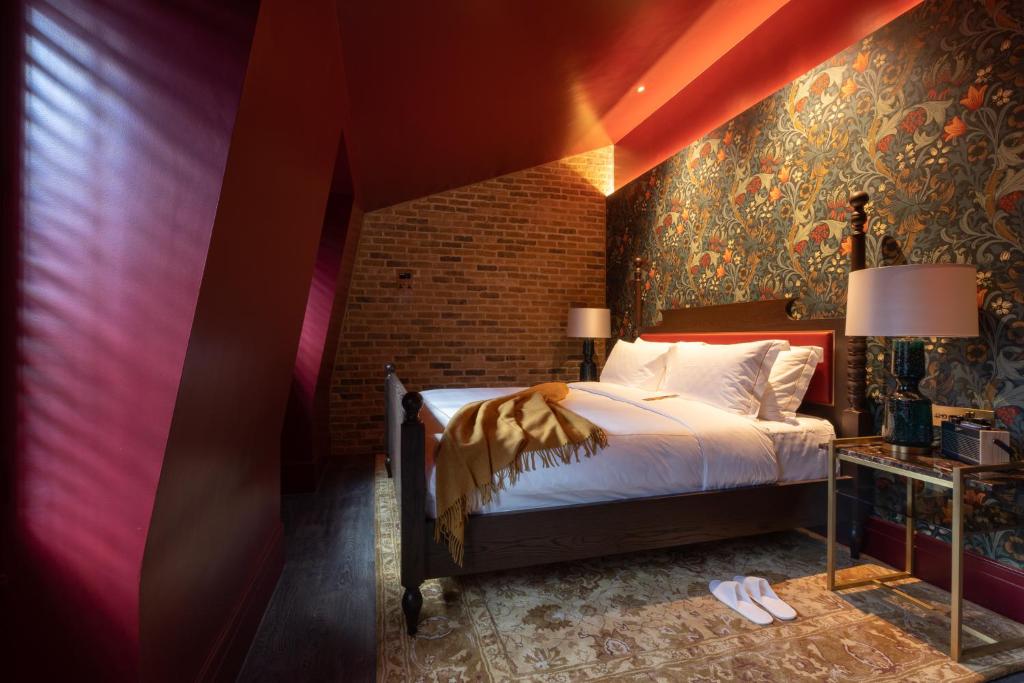 Postel nebo postele na pokoji v ubytování Sun Street Hotel Shoreditch