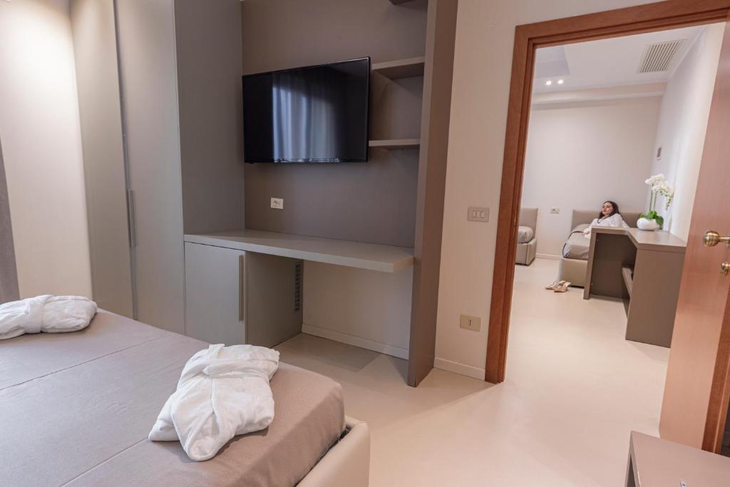 TV a/nebo společenská místnost v ubytování Hotel Beaurivage
