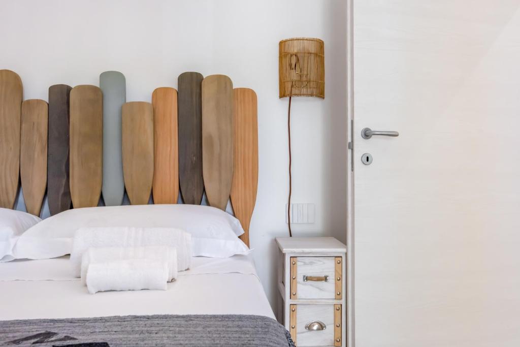 Posteľ alebo postele v izbe v ubytovaní Scuole CEMM San Vito Apartment with parking