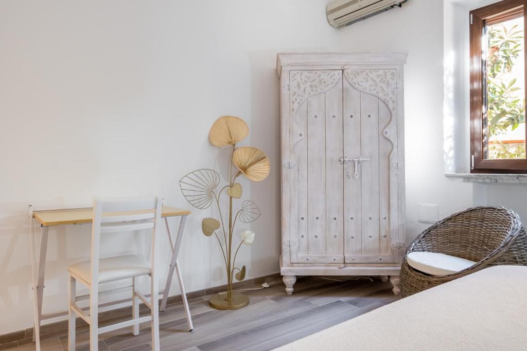 Posteľ alebo postele v izbe v ubytovaní Scuole CEMM San Vito Apartment with parking