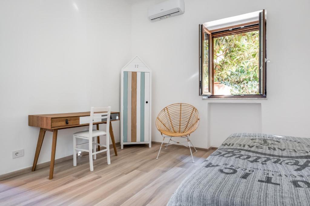 Posteľ alebo postele v izbe v ubytovaní Scuole CEMM San Vito Apartment with parking