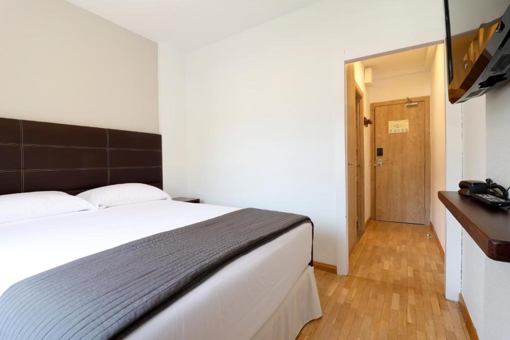 TV a/nebo společenská místnost v ubytování Hotel Blu Aran