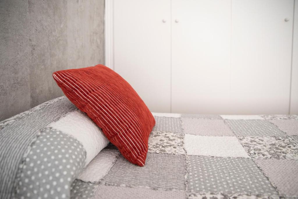 Postel nebo postele na pokoji v ubytování Hostal Tokio