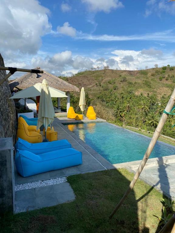 Bazén v ubytování Lombok Khophilauvillas nebo v jeho okolí