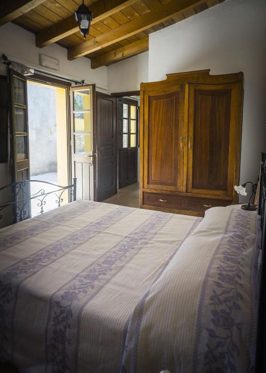 Postel nebo postele na pokoji v ubytování Albergo Diffuso Il Mandorlo
