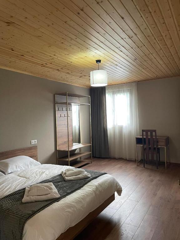 Postel nebo postele na pokoji v ubytování Mestia Views